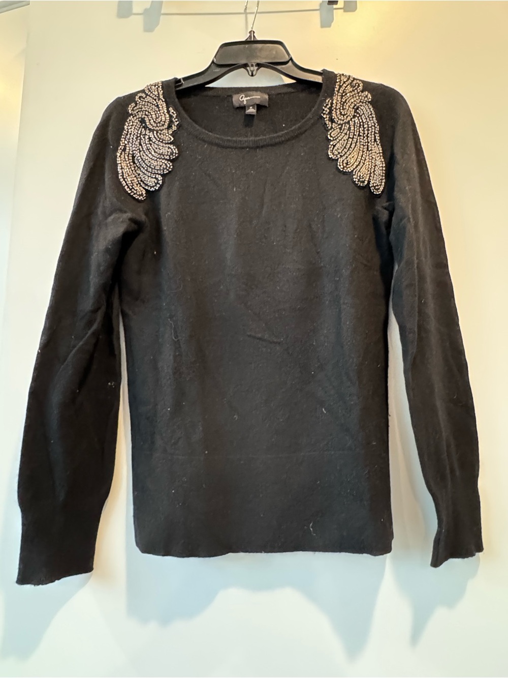The ACQUA Brand Black Sweater with Beaded Shoulder Appliqués